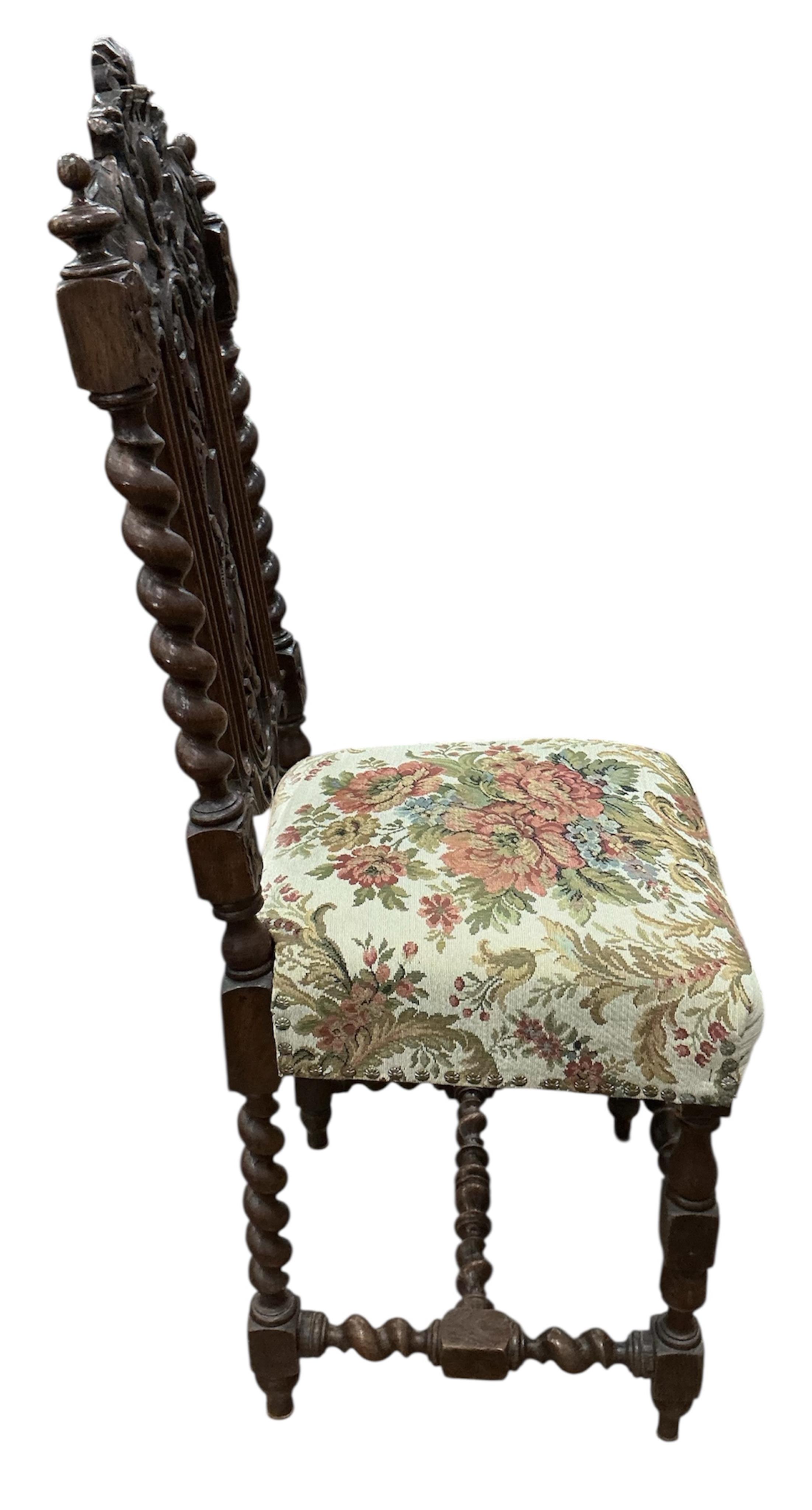 A set of six Victorian carved oak dining chairs, width 38cm, depth 40cm, height 114cm